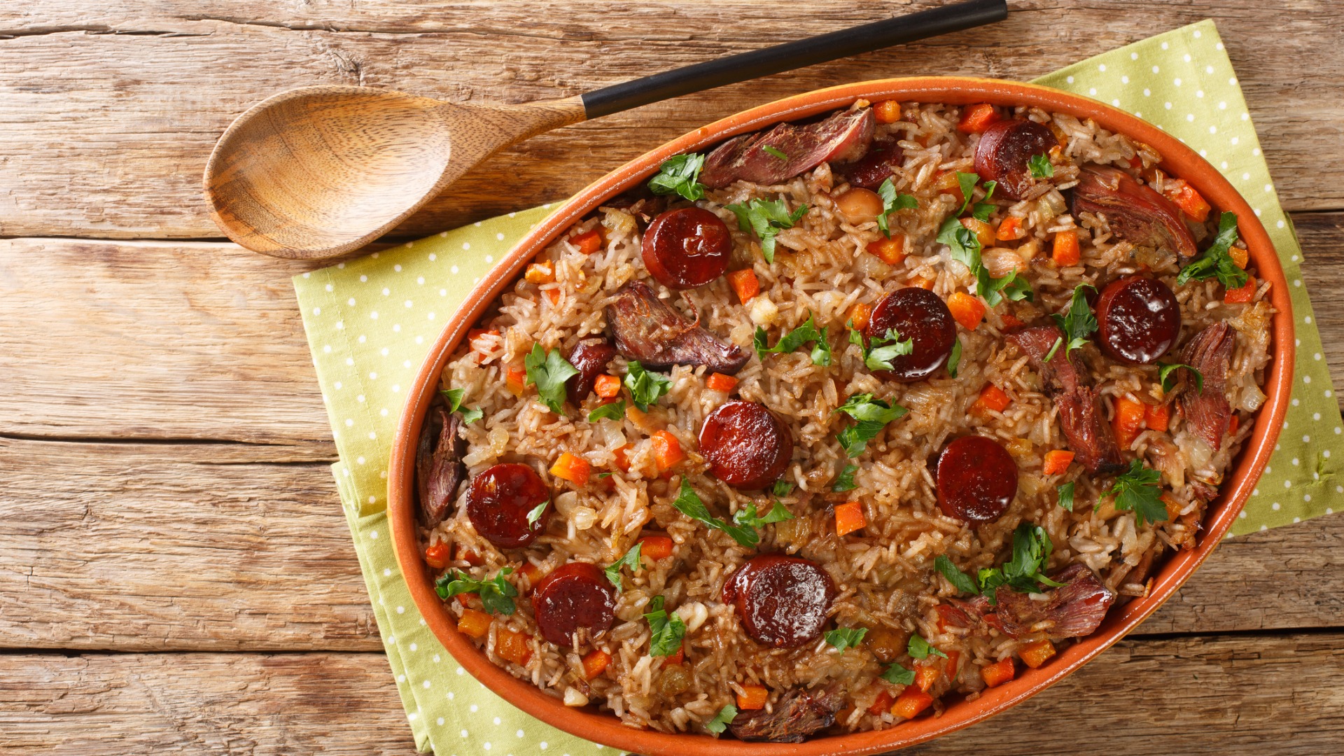 A top down image of a pot filled with Arroz de Pato. 