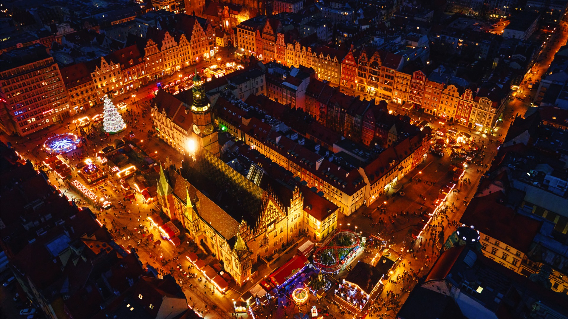 An aerial view of Wroclaw looking festive with Christmas lights and decorations. 