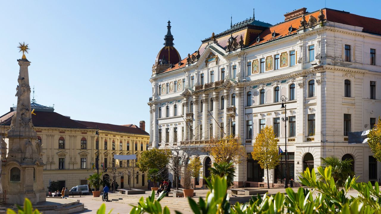 View of the County Hall of Baranya on the main square in Pecs. Spring is the best time to visit Hungary if you want to explore lesser-known towns.