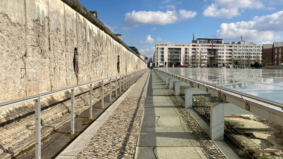 A walking path along a remaining part of the Berlin Wall. 