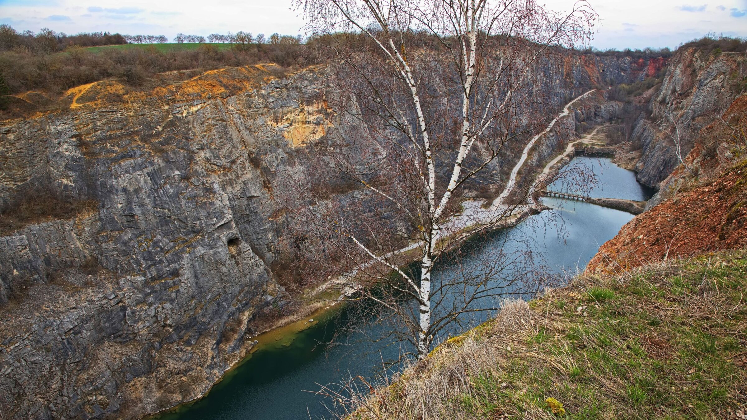 An abandoned limestone quarry in a landscape of raw beauty.