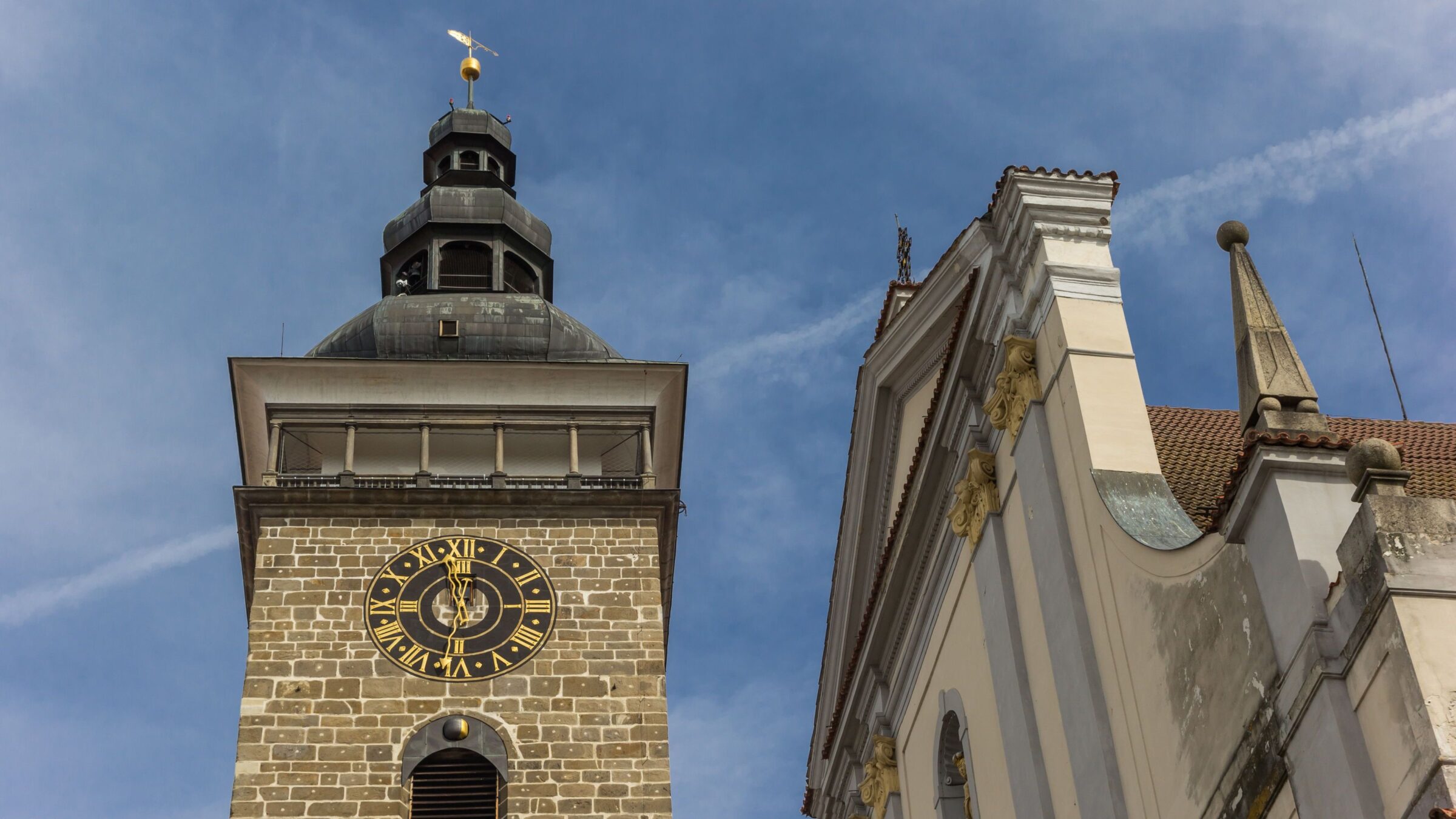 The Black Tower and the facade of the Cathedral in Ceske Budejovice, Czech Republic.