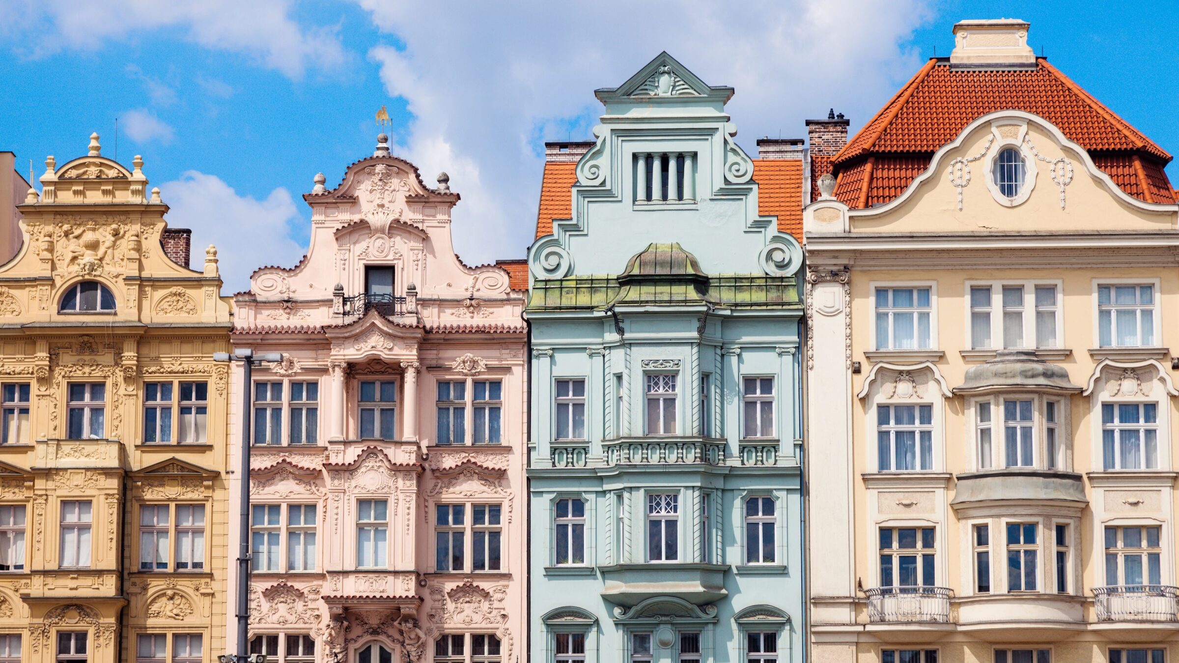 A row of beautiful pastel-colored buildings.
