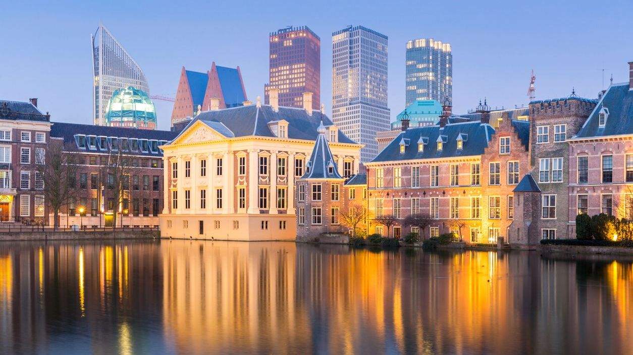 Binnenhof Palace in The Hague, where the Parliament of the Netherlands is housed, at dusk.