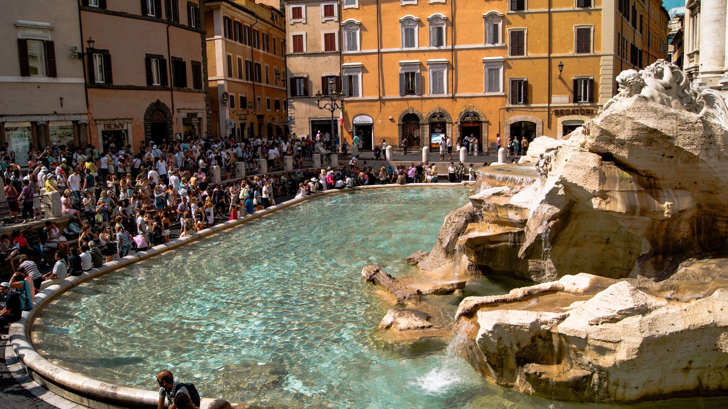 Crowds gathered at the Fontana di Trevi in Rome. 