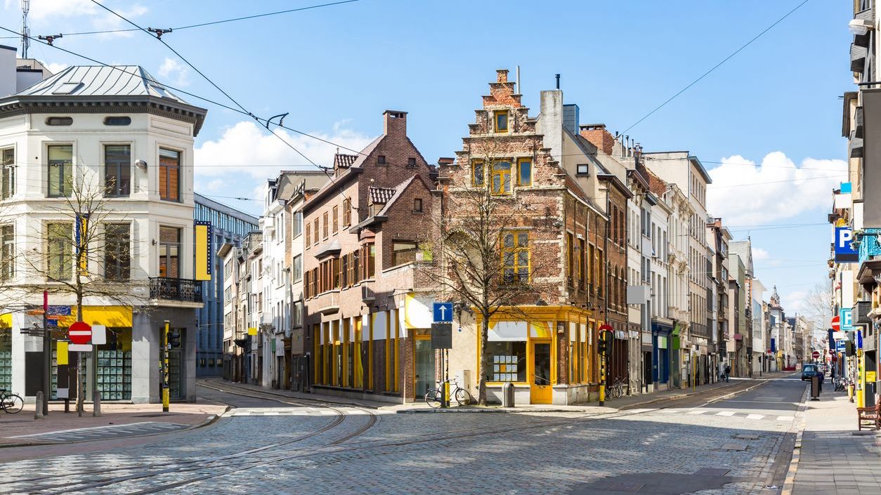 A cityscape of the Meir shopping street in Antwerp downtown in Belgium with tram track.
