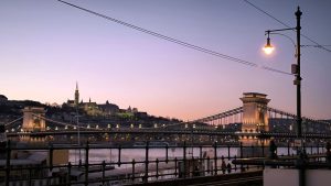 A panoramic view of Budapest with Chain Bridge and Buda Castle.