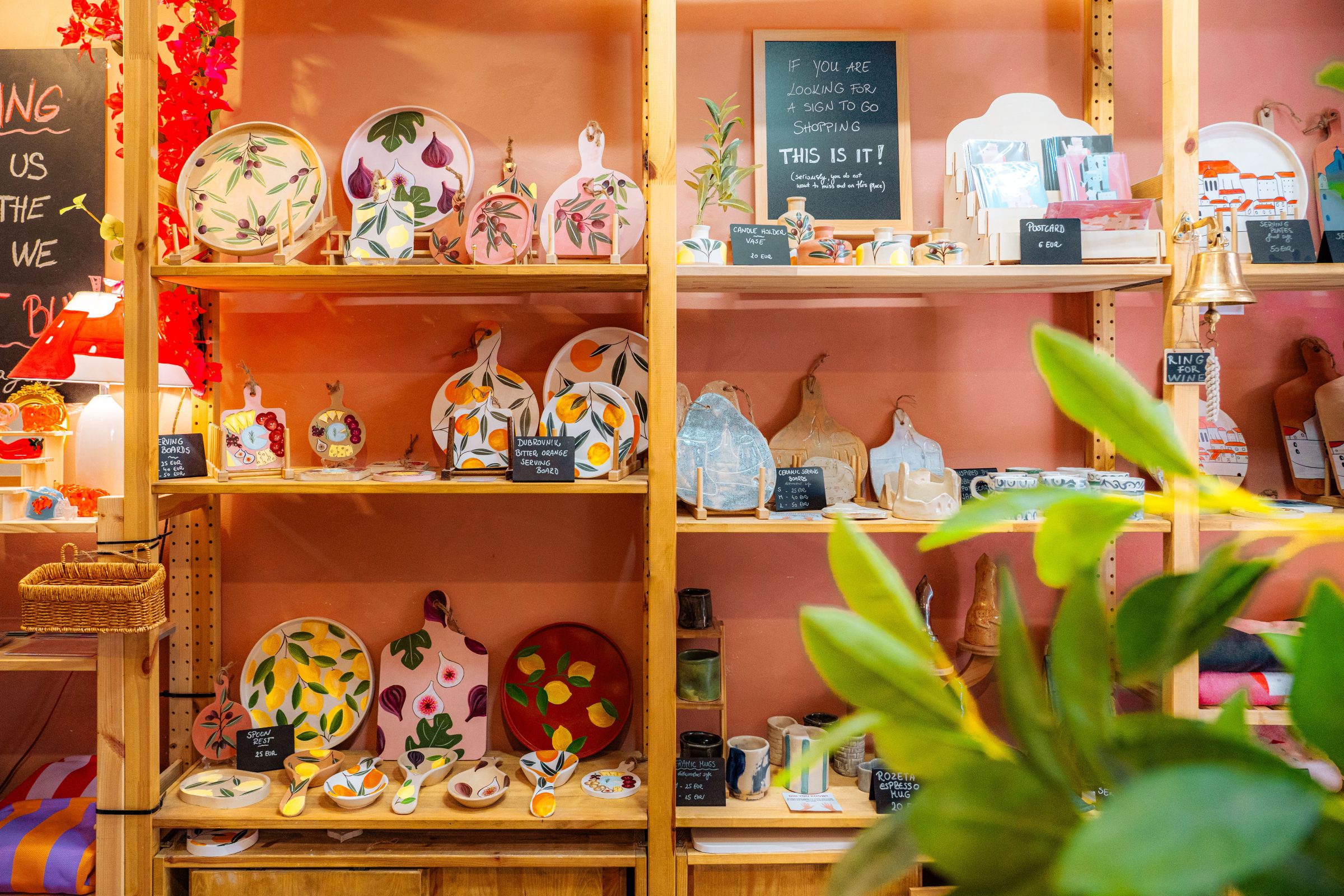 Inside a souvenir shop with handmade items on display. 