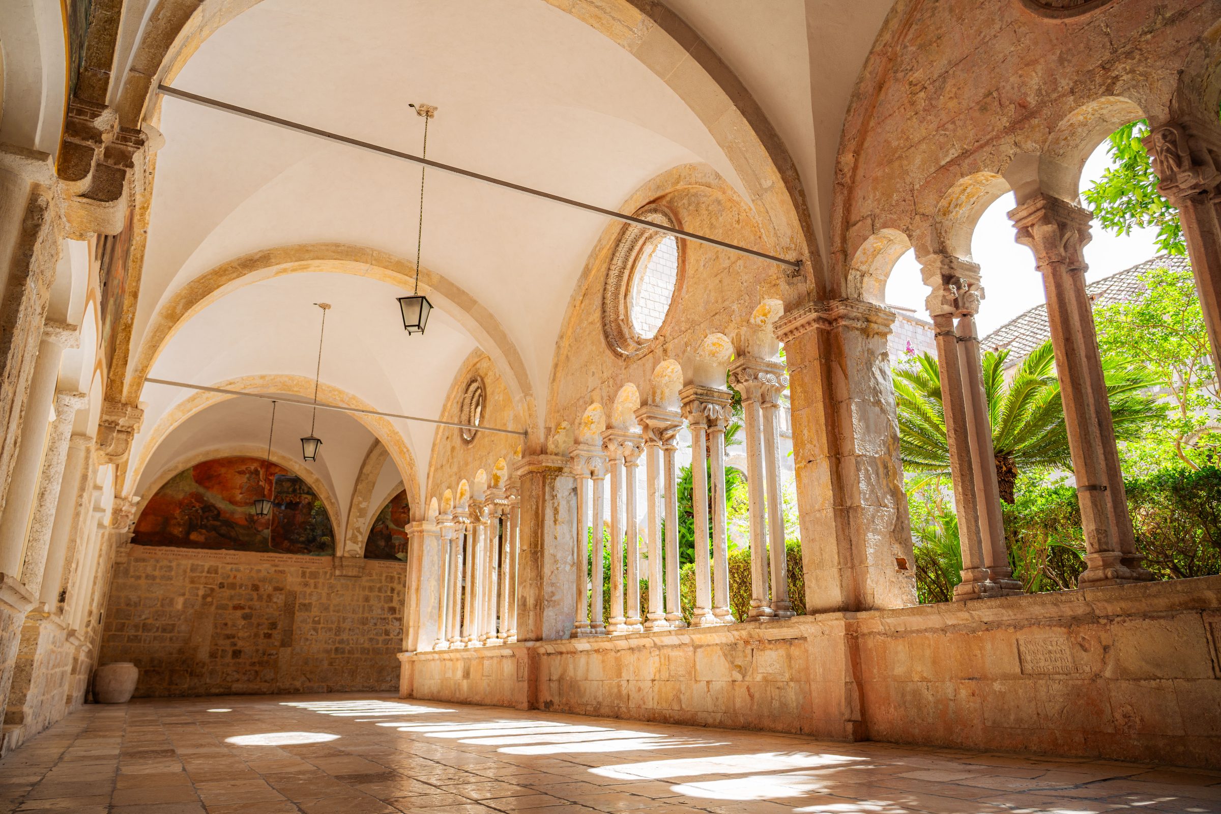 A sunlit corridor of the Franciscan Monastery. 
