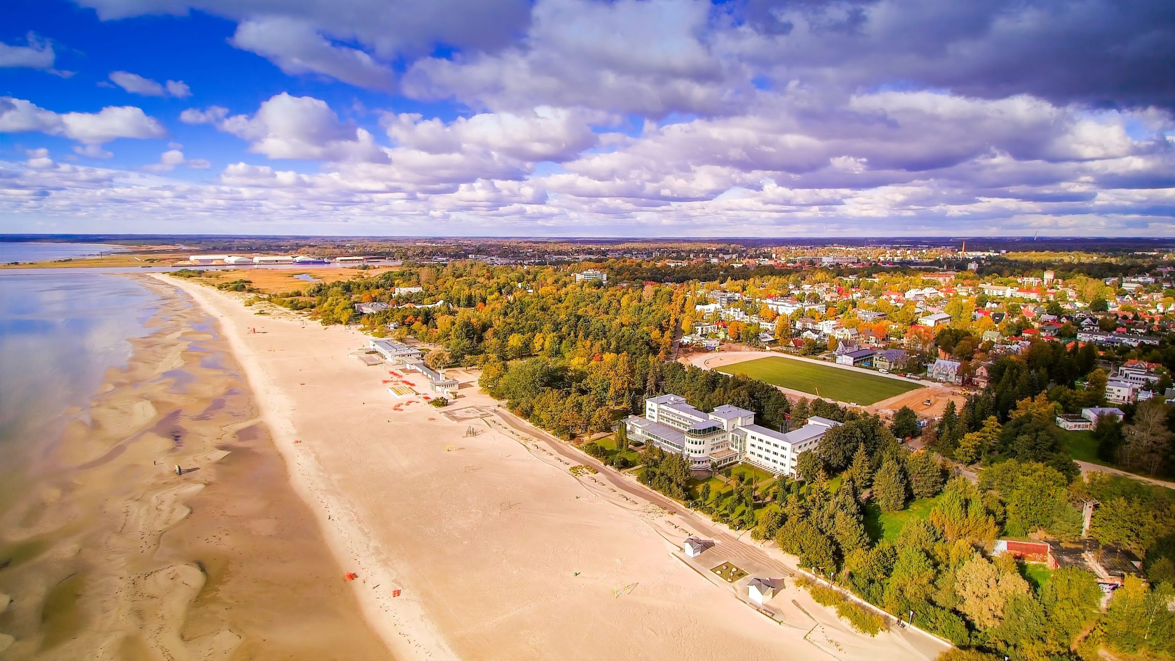 A town built along a long sandy beach.