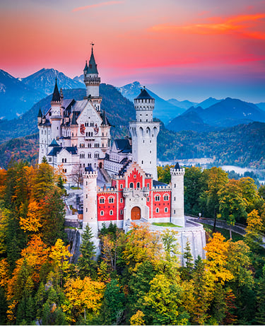 Neuschwanstein Castle, Germany - Bavaria in beautiful autumn colors, Fussen province and Bavarian Alps, german travel background.