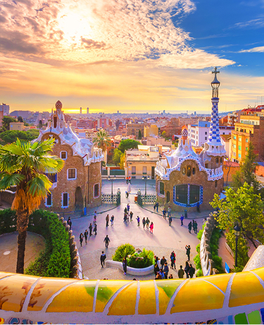 Gaudí’s unique architectural details and colorful ceramic tiles at Park Güell in Barcelona, Spain.
