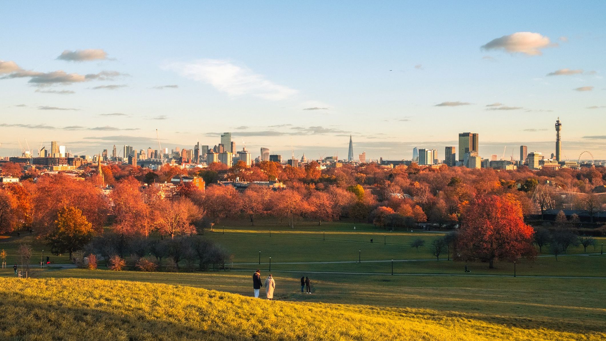 The view of London's skyline from Primrose Hill, offering a stunning panorama of the city's iconic landmarks. Located in North London, Primrose Hill provides an elevated perspective of the city, including landmarks such as the Shard, the London Eye, and the BT Tower. If you're wondering what to do in London like a local, Primrose Hill is a must.