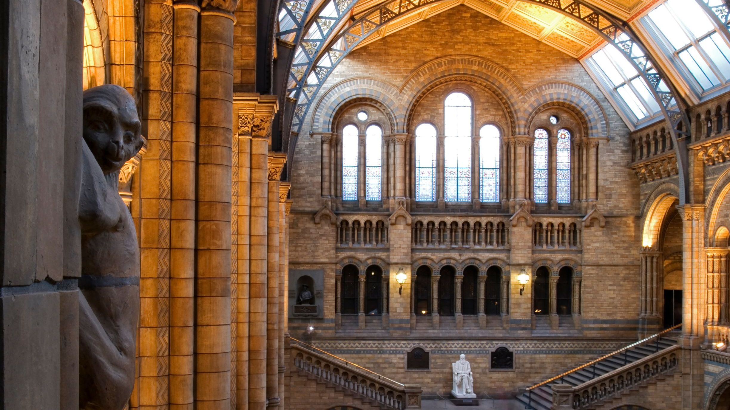 The main hall of the Natural History Museum. This view includes the Statue of Charles Darwin (by Sir Joseph Boehm).