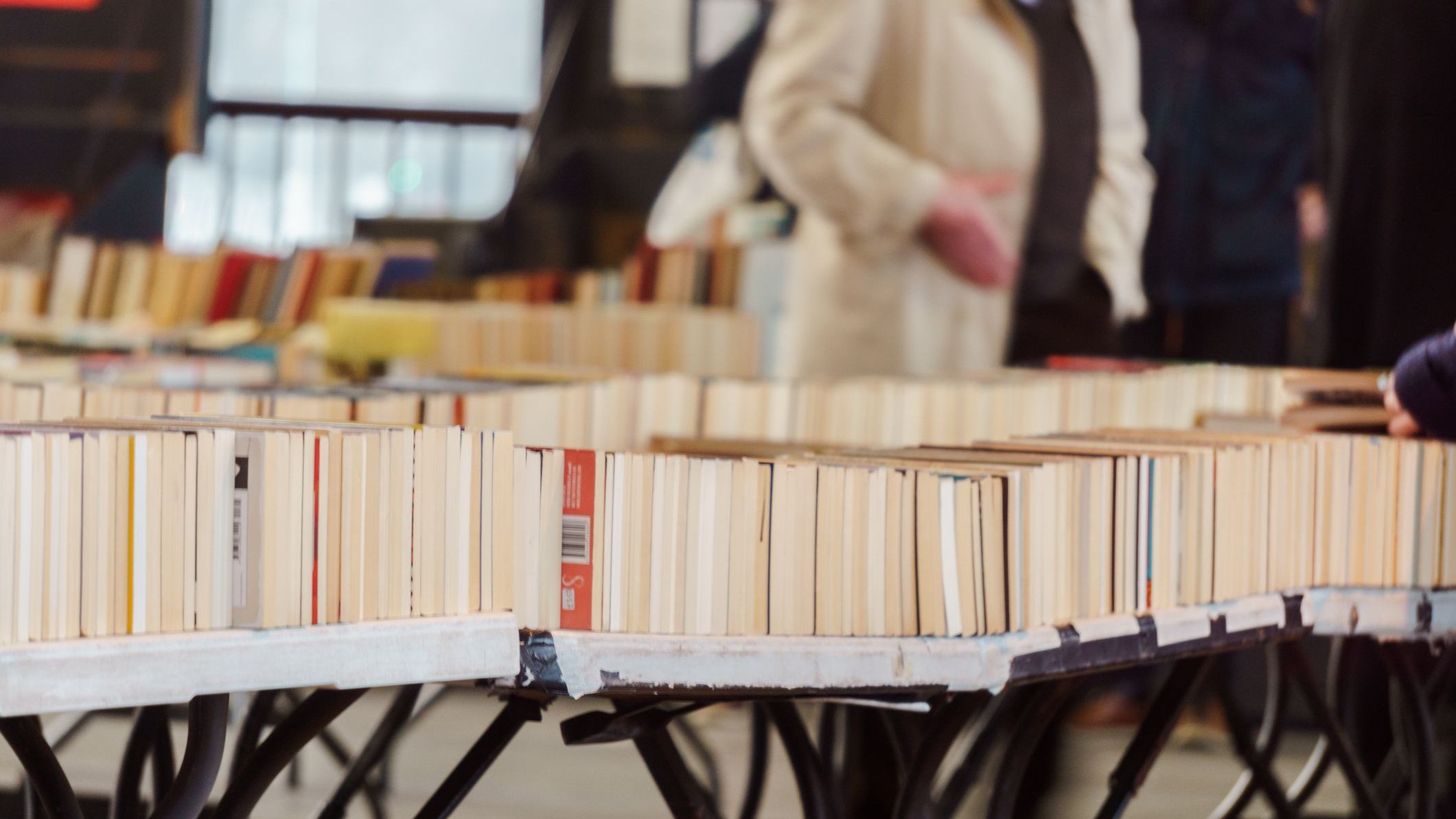 Tables full of books.