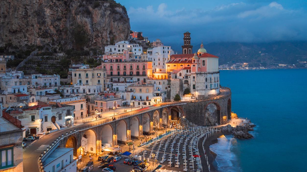 Twilight over the seaside village of Atrani, one of the must-see places on the Amalfi Coast.