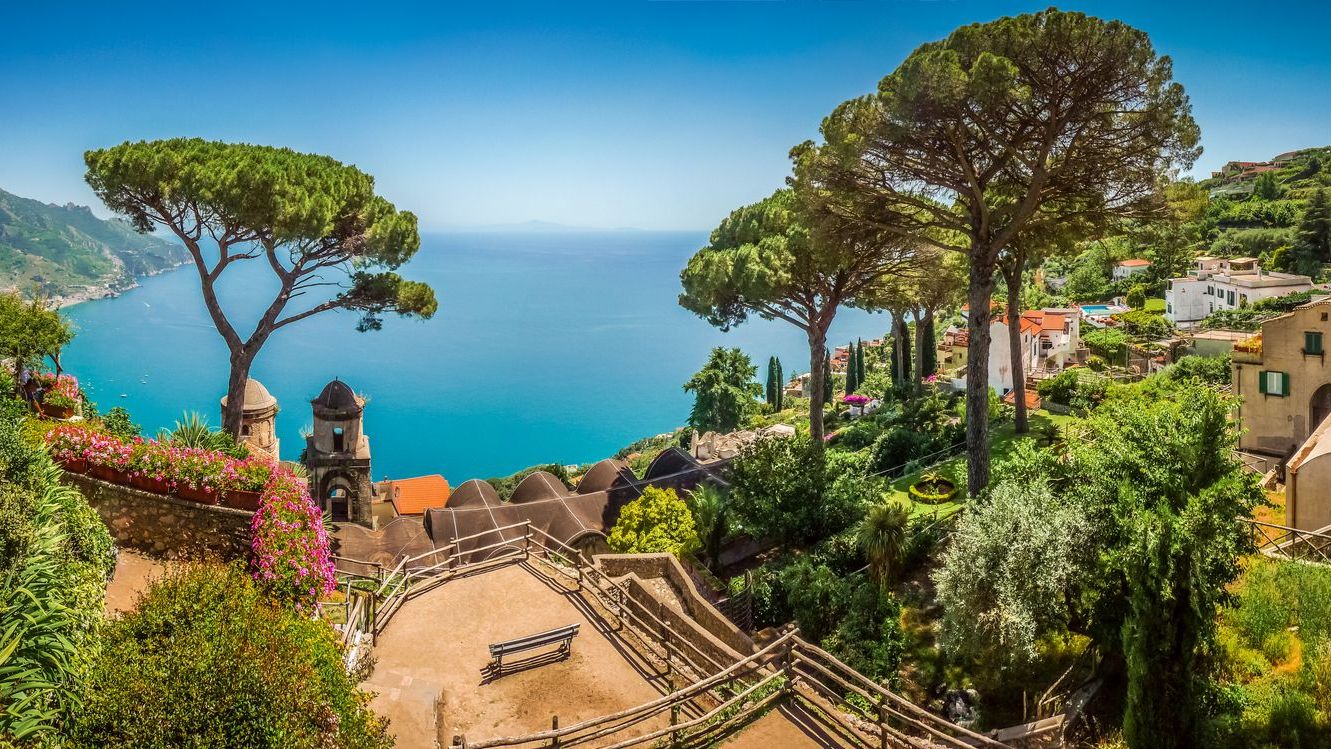 The scenic, picture-perfect view of the famous Amalfi Coast from the Villa Rufolo gardens in Ravello, Campania, Italy.