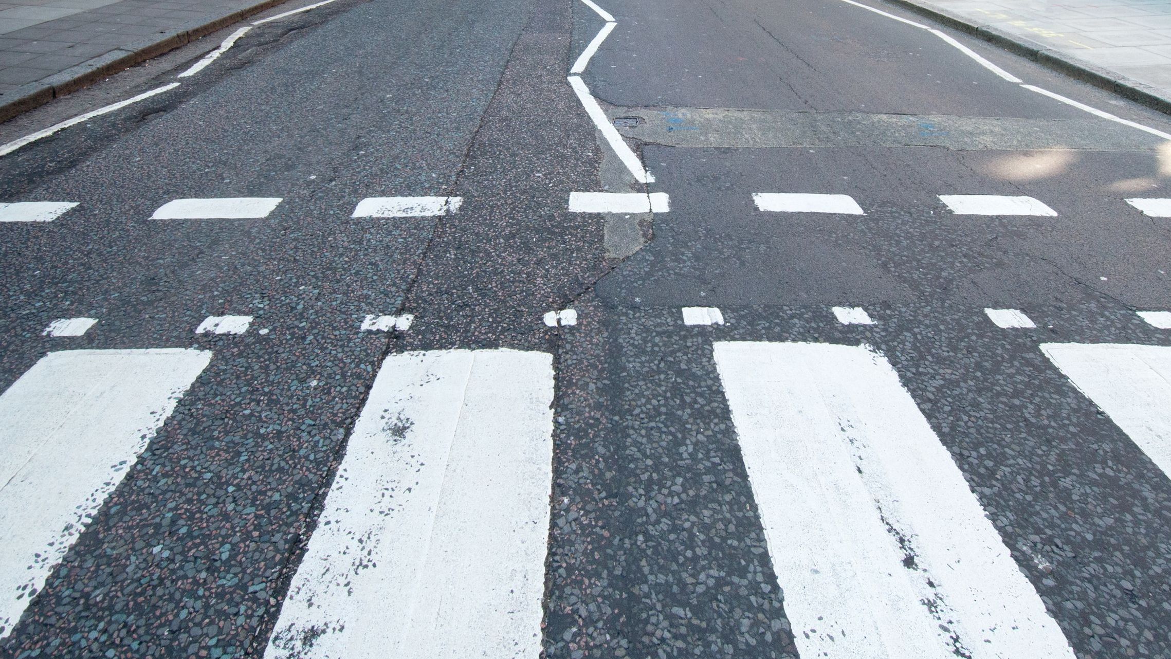 Abbey Road zebra crossing made famous by the 1969 Beatles album cover.