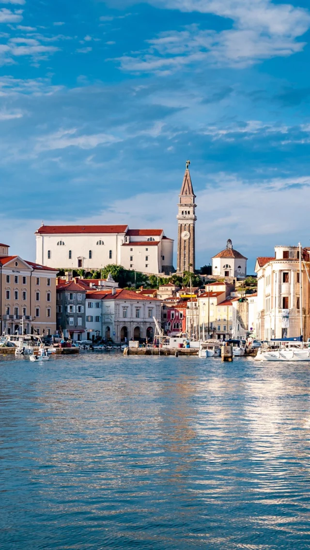 For such a tiny country, #Slovenia sure packs in a whole lot. Often overlooked because of its big-name neighbors, Italy, Austria, Croatia, and to an extent, even Hungary, Slovenia delivers on so many levels that we are surprised it isn't more popular. 
From cute-as-a-button capital Ljubljana (population under 300,000), to majestic Lake Bled, or untouched Lake Bohinj, wine regions in the north of the country, the Julian Alps and Soca River Valley, to Venetian-flavored Piran on the coast, you could spend weeks discovering Slovenia and still want to come back for more. 

This video is just a sampler of the delights of Slovenia.